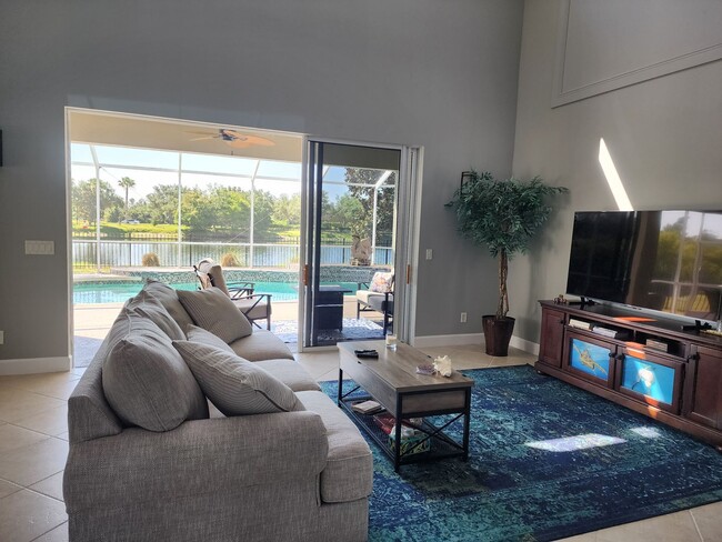 Building Photo - NORTH PORT - Rare Waterfront 4 bedroom pool home Annual/Unfurnished