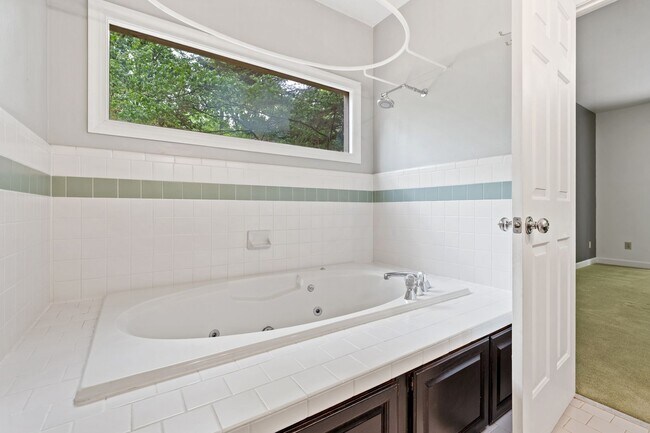 Building Photo - *APPLICATIONS PENDING* Bolin Creek 4 Bedroom House with Fabulous Forest Views Available May 15!