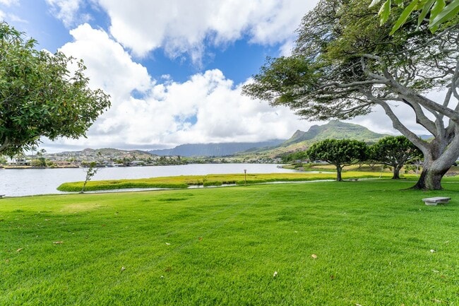 Building Photo - Lakeside, fully furnished, two bedroom, one bath townhome with enclosed garage.