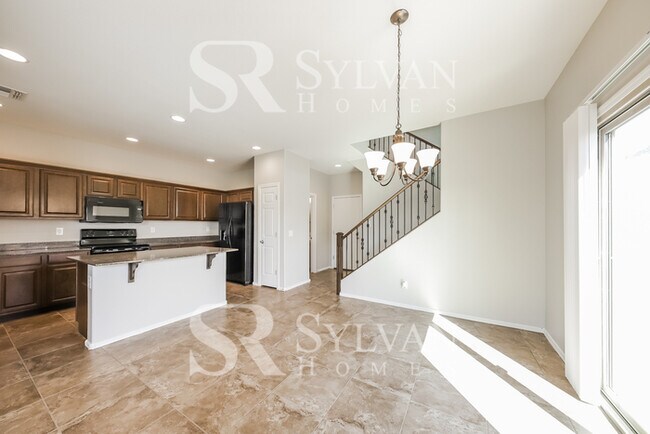 Building Photo - This home exudes a cheerful and welcoming charm!