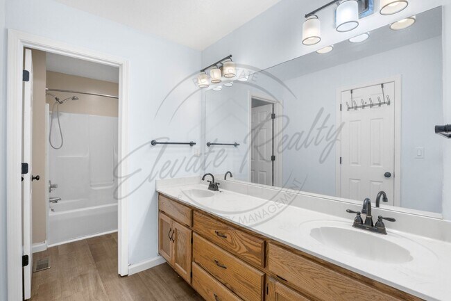 Building Photo - Three Bedroom Two Story with a Flex Baseme...