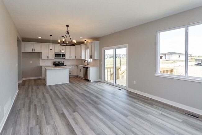 Building Photo - Spacious 4-Bedroom Home with 2-Car Garage & Yard