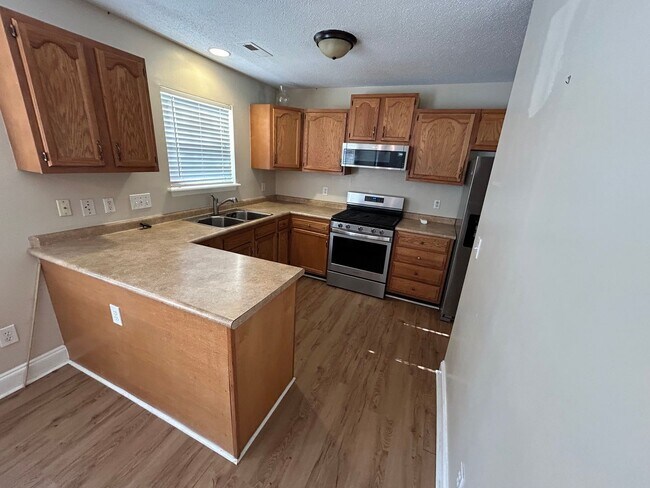 Building Photo - COMING SOON! N Greensboro, 4/2.5 home off of N Church St near Lake Jeanette & I-840