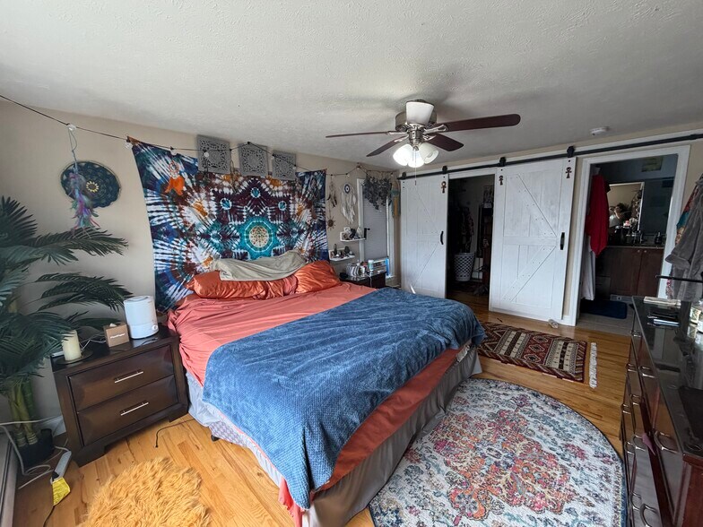 Master bedroom with walk in closet and ensuite bathroom - 207 Pasture Dr