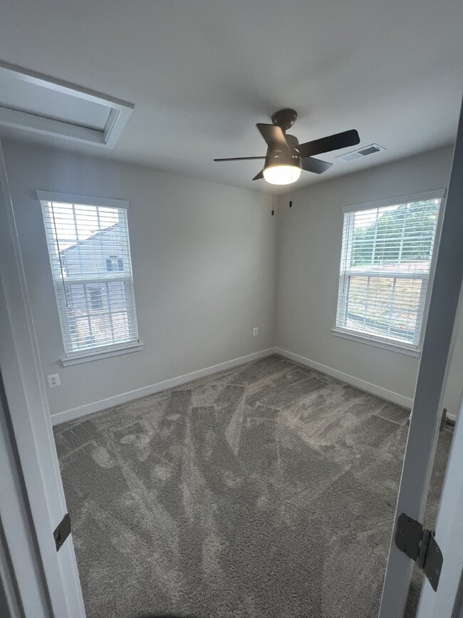 Building Photo - Exceptional 3-Level Corner Unit Townhome w...