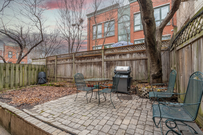 Side yard with garden and patio - 1208 Constitution Ave NE