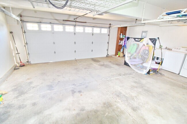 Building Photo - Malimali Street home with garage, fenced y...