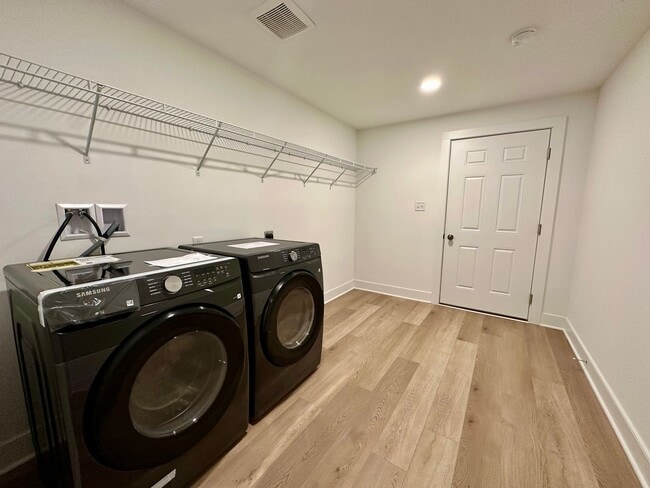 Building Photo - 4004 Winds Field Way