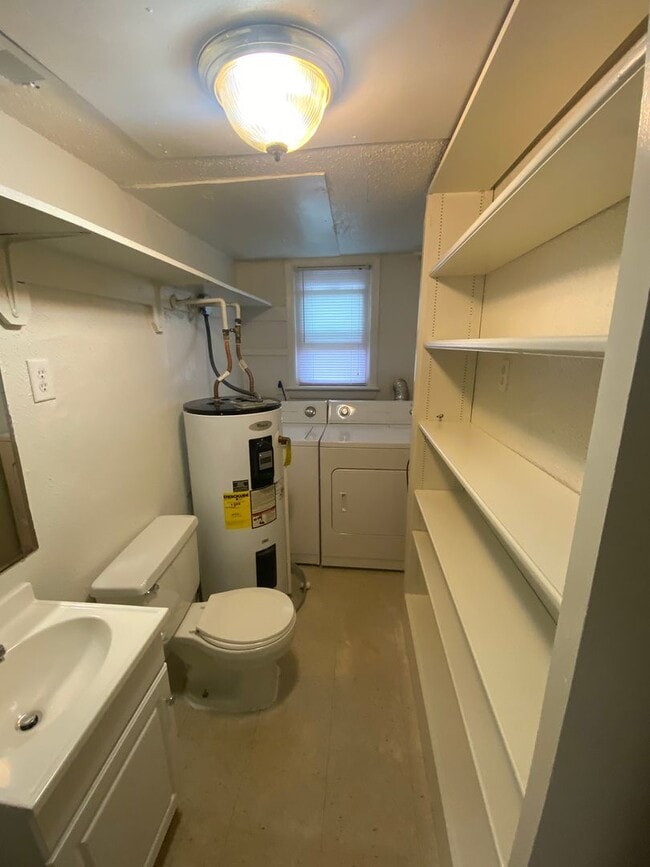 Building Photo - A brick townhouse steps from Lakewood shopping and dining — with everything already in it.