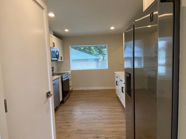 Building Photo - 10448 2nd Ave SW