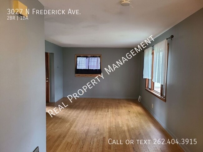 Building Photo - 3027 N Frederick Ave