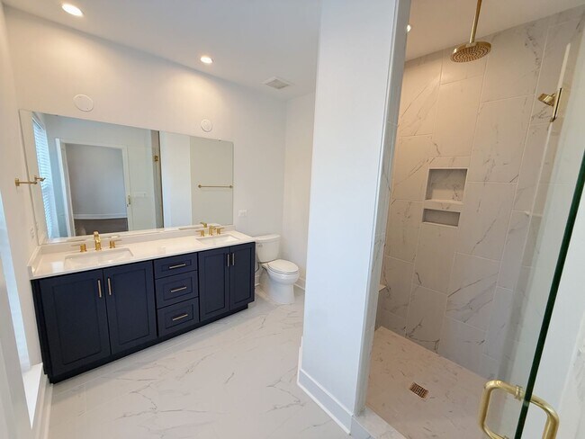 Building Photo - Brand new 4 level, 4 Bedroom Townhome with Elevator!