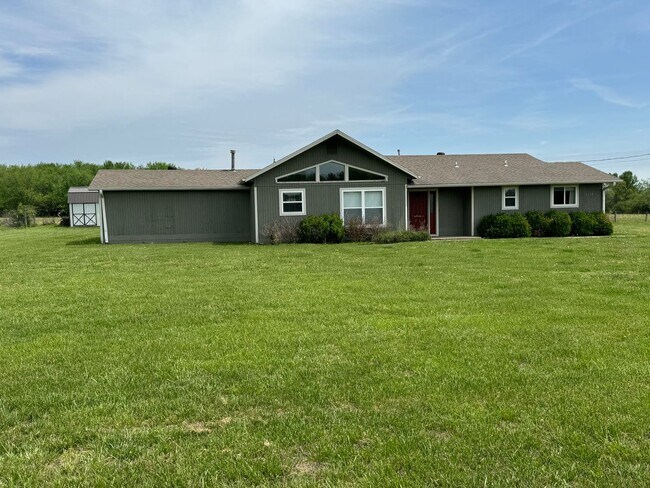 Building Photo - Available July 2025! 4-Bedroom, 2-Bathroom...