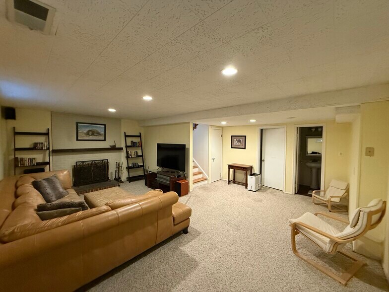 Large finished split-level basement and family room. Landry room and storage room. - 3307 Webley Ct