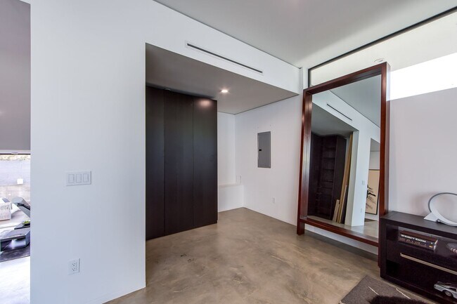 Building Photo - Architectural 1-Bed Designer Residence wit...