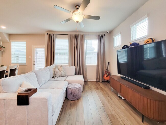 Building Photo - A true gem on a quiet corner lot, this spacious and sun-filled home is tucked away from street no...