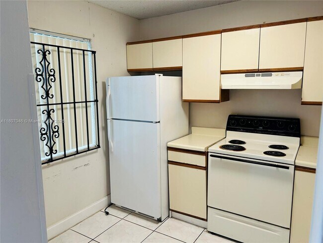 Building Photo - 8720 N Sherman Cir