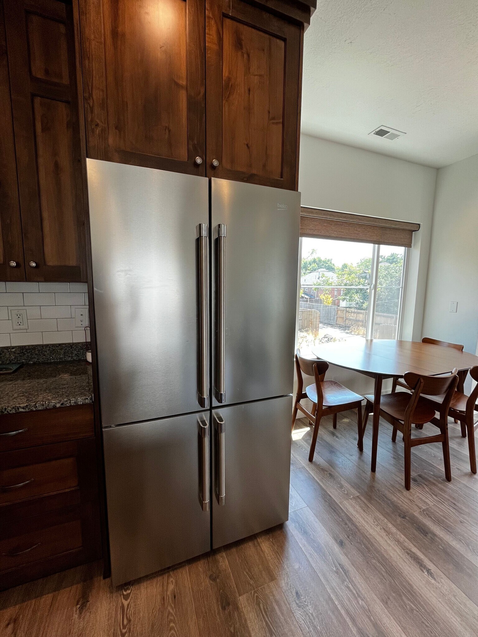 Beko four door stainless refrigerator with filtered water dispenser and ice maker. - 361 W Reed Ave