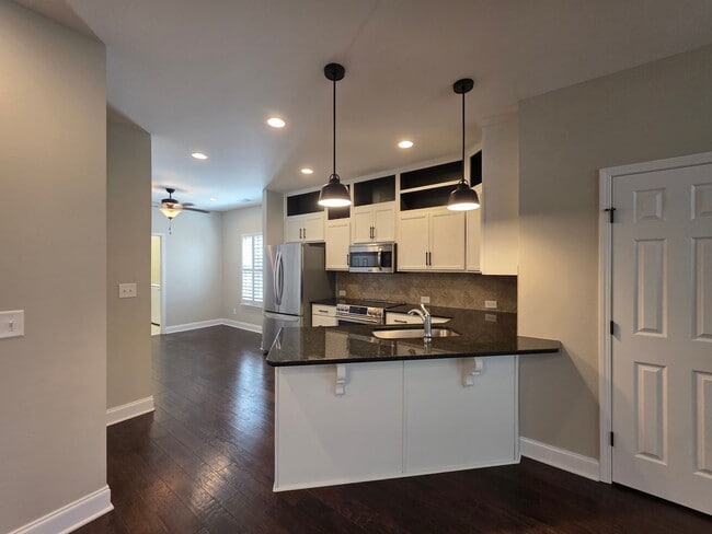 Building Photo - For Lease  End-Unit 3-Bedroom Townhome wit...
