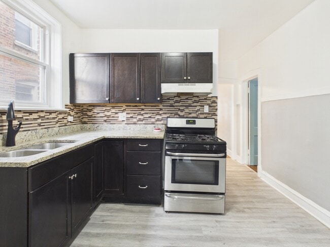 Building Photo - 7631 S Cornell Ave