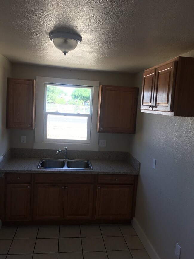 Building Photo - Available Soon! WITH HVAC