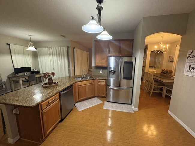 Building Photo - Florida Living Starts Here — Gated, Single-Story, Move-In Ready May 1!