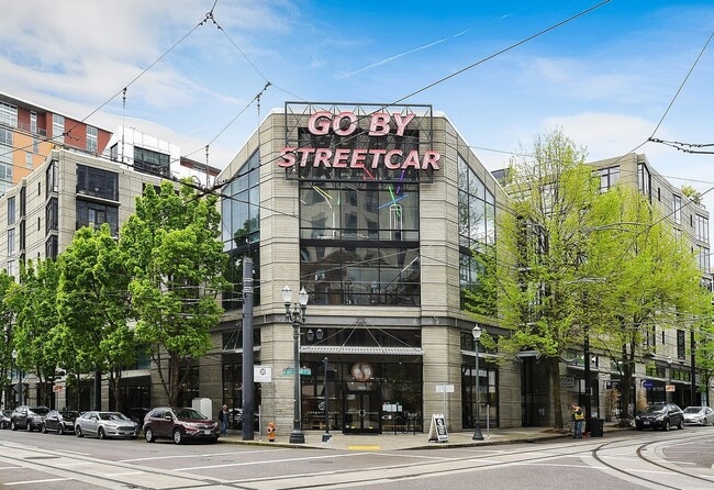 Building Photo - 1/2 Month FREE: Rare Streetcar Lofts Gem w/ Parking & Utilities