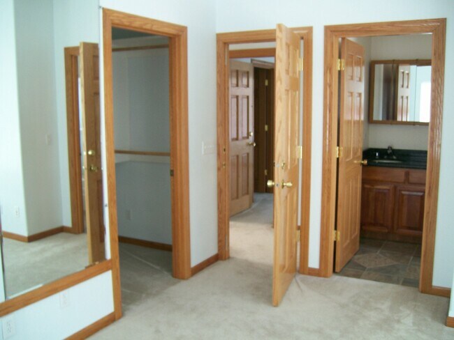 Building Photo - Centrally Located Custom Home each bedroom...