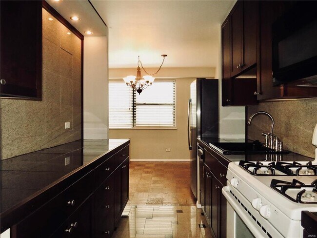 Kitchen and Dining - 4466 W Pine Blvd