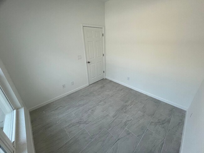 Building Photo - BRAND NEW MODERN SF HOME 3BD+den/2BA with GARAGE IN LEHIGH ACRES!
