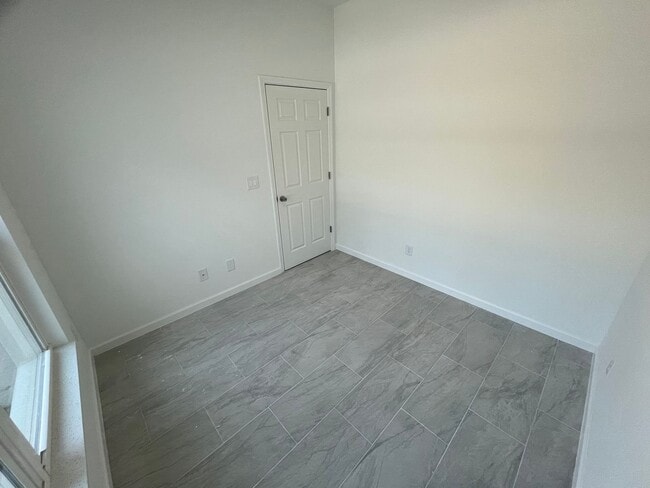 Building Photo - MODERN BRAND NEW 4BD/2BA RETREAT IN LEHIGH ACRES!