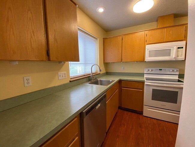 Building Photo - Great Duplex Unit with Attached Garage, Covered Patio, and Two Primary Suites