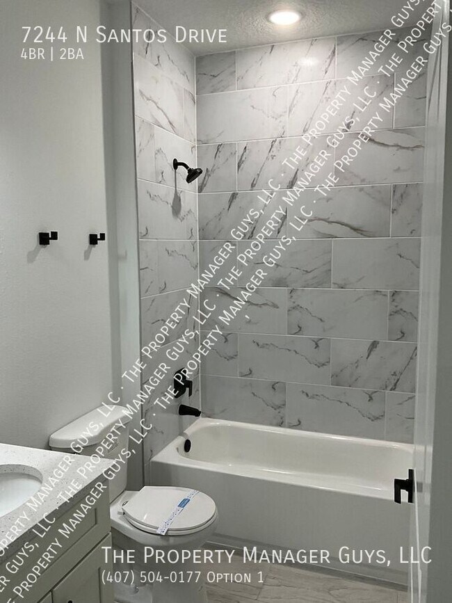 Building Photo - 7244 N Santos Dr