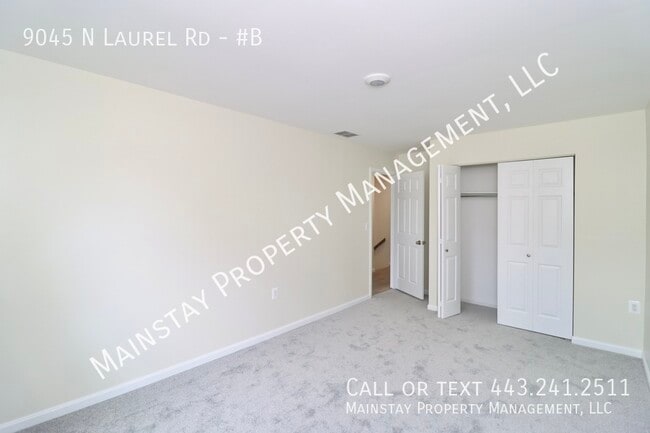 Building Photo - 9045 N Laurel Rd