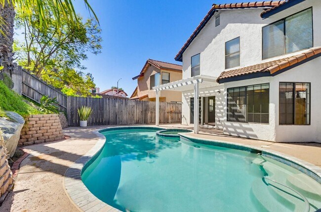 Building Photo - Stunning Upgraded 4BR Home with Pool in Desirable Rancho San Diego – Move-In Ready