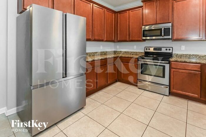 Building Photo - 8906 Devon Pines Dr