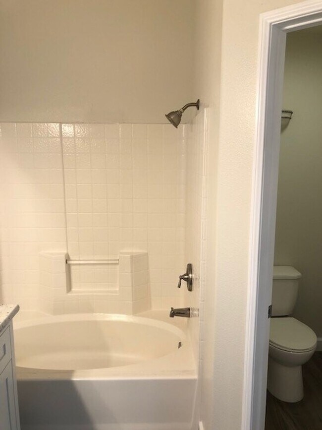 Building Photo - PICTURE PERFECT 2 BR/2 BATH PLUS LOFT END UNIT CONDO WITH DIRECT ACCESS 2 CAR GARAGE