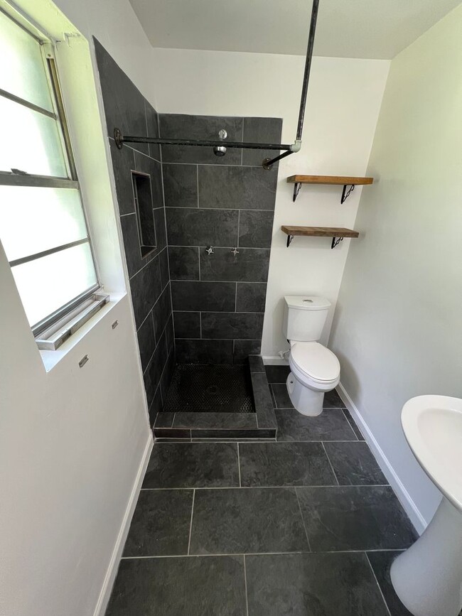 Building Photo - Updated 3BR | Solar Panels + Fenced Yard