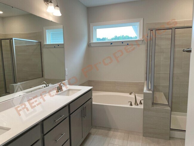 Building Photo - Spacious 4 Bedroom, 3 Bathroom Home w/ 2-C...