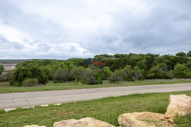 Building Photo - Beautiful 4 Bedroom Home with Covered Patio & Hill Country Views