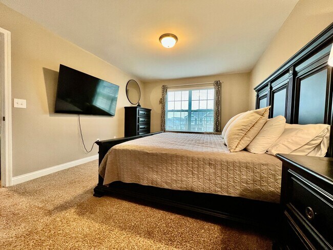 Building Photo - Executive corporate rental features community pool. Fully furnished and includes all utilities.