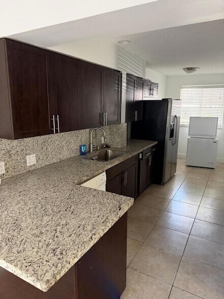 Building Photo - 10939 W Broward Blvd