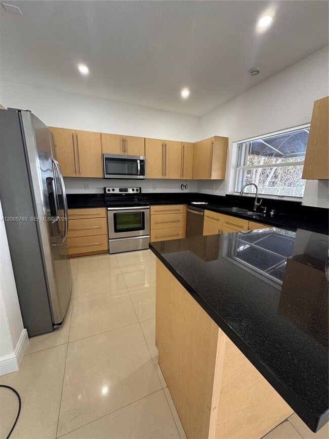 Building Photo - 15071 SW 136th Pl