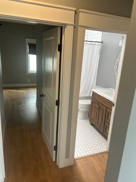 Guest bathroom into guest bedroom - 1534 Manhattan Beach Blvd