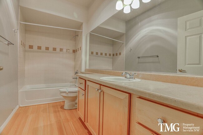Building Photo - Spacious Ground-Level 2BD Condo with Garage & Resort-Style Amenities