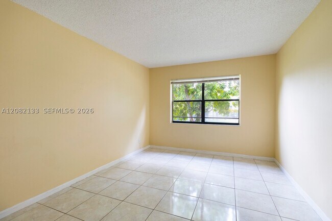 Building Photo - 9022 NW 28th Dr