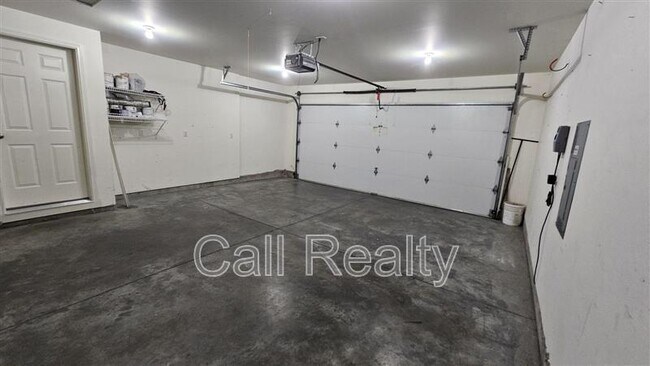 Building Photo - 9302 W Caelen Ave