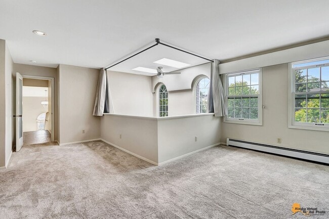 Building Photo - Spacious and bright condo located in a quiet area that boasts the perfect combination of style an...