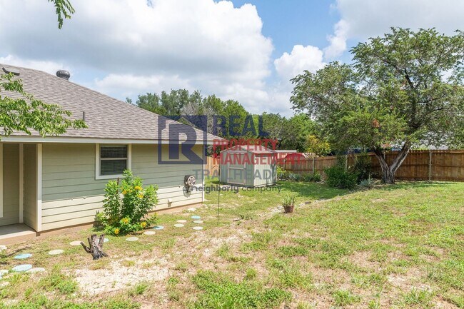 Building Photo - Well-Maintained Home with Large Yard and Storage Shed