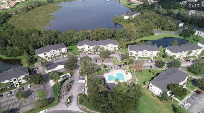 Building Photo - Beautiful 2BR/2BA Condo in Sunset Lakes – Lake & Tree Views!